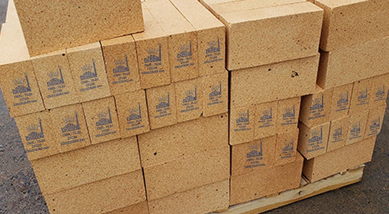 Pallet of Crown CWN-70.20 high alumina bricks, each end stencilled with the Crown mark, grade and batch code