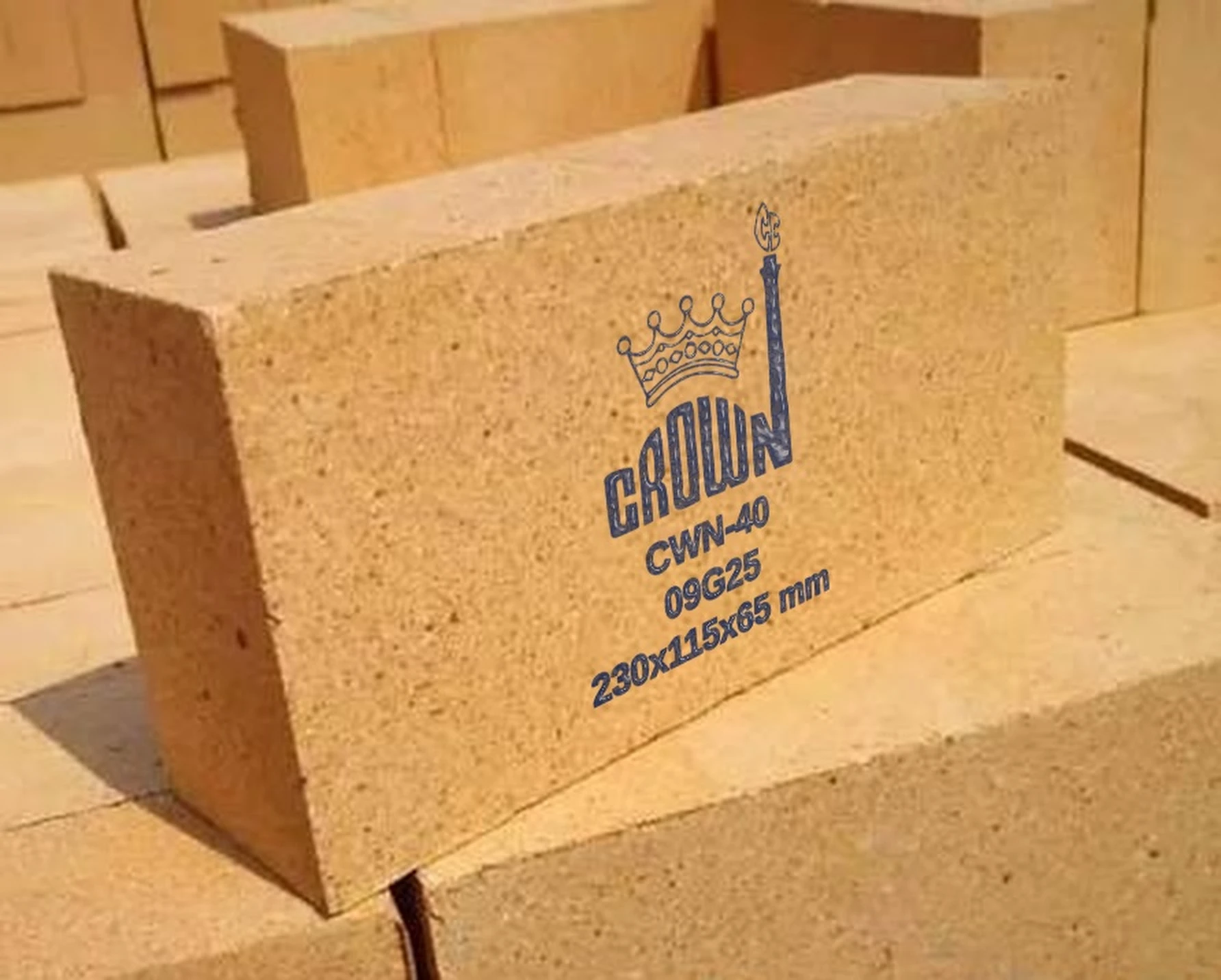 A Crown CWN-40 fireclay brick stencilled in dark blue with the Crown mark, grade, batch code and size