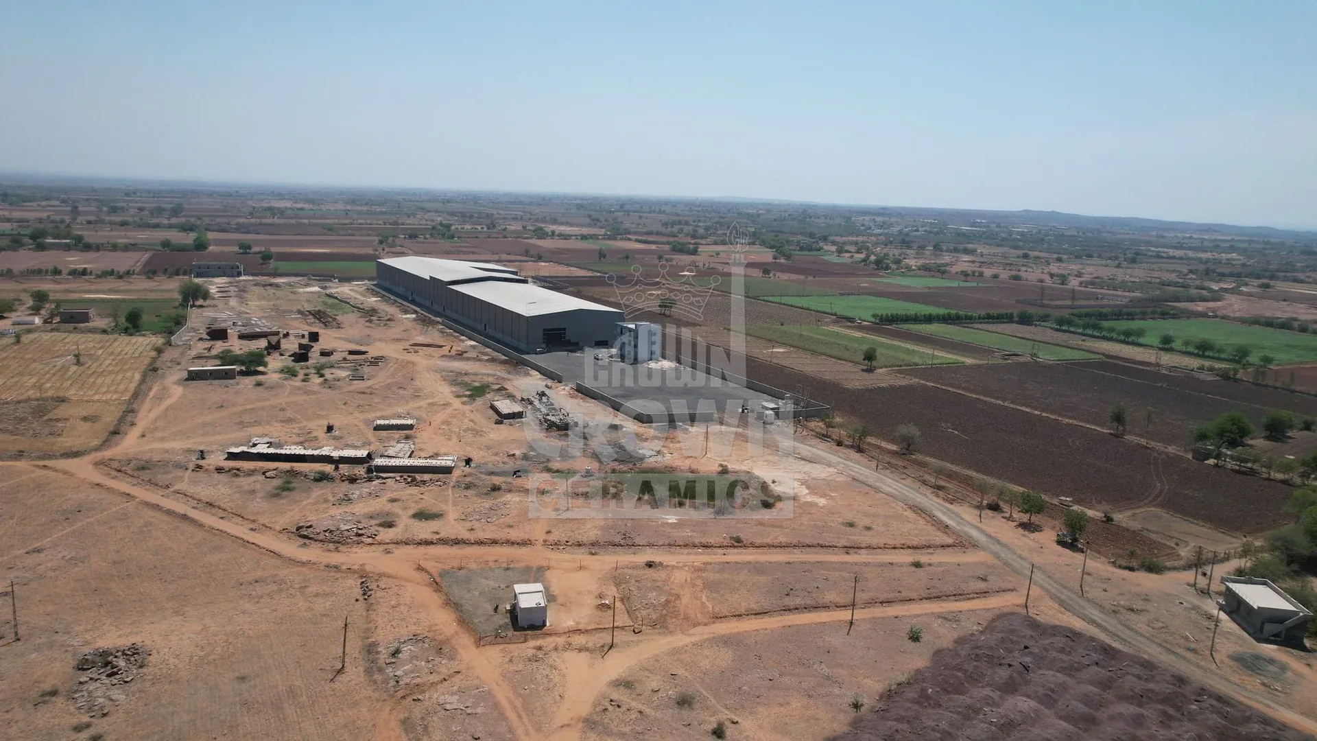 Wide aerial view of the plant and surrounding land