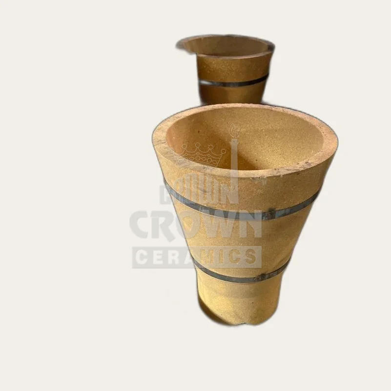 Banded refractory funnel for the trumpet